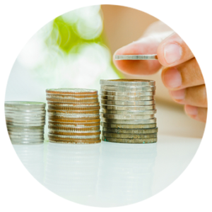 Woman stacking coins in a row