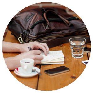 Writing notes on a wooden table